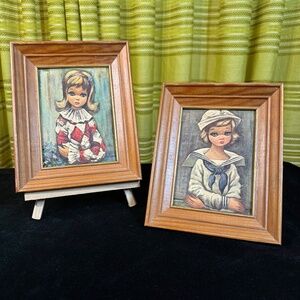 Vintage 70s pair of Eden prints, Sailor and Harlequin, wood framed, damaged